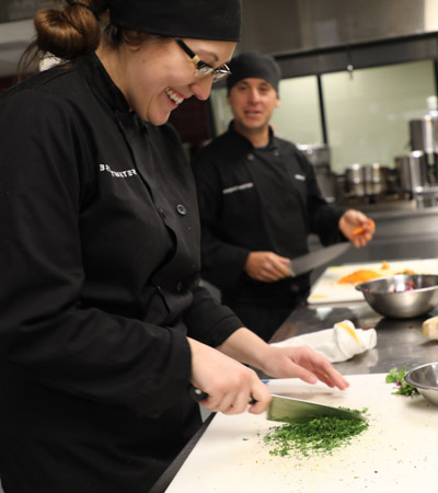 Culinary students cooking together